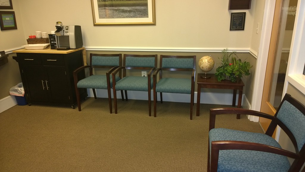 Professional cleaning agents working in modern office premises.